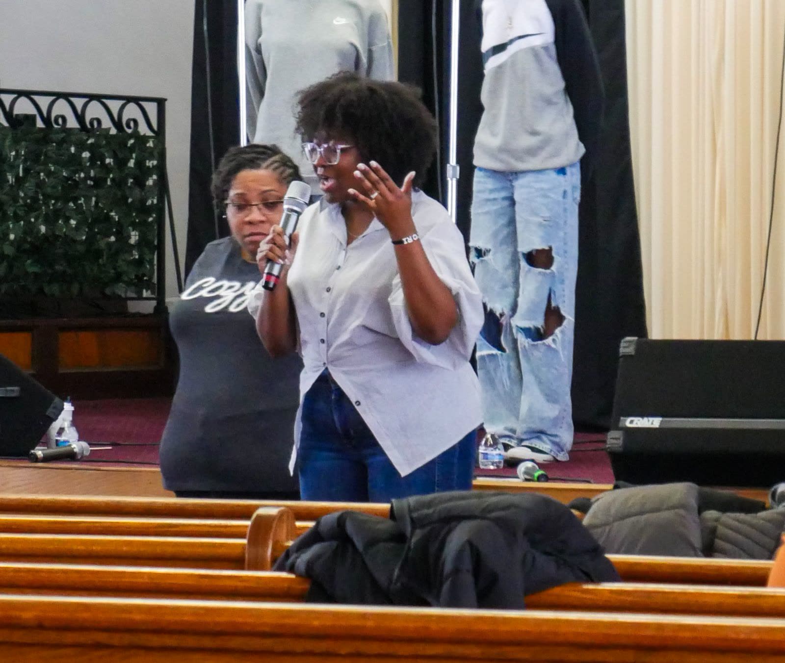 Hands raised in worship during a praise service